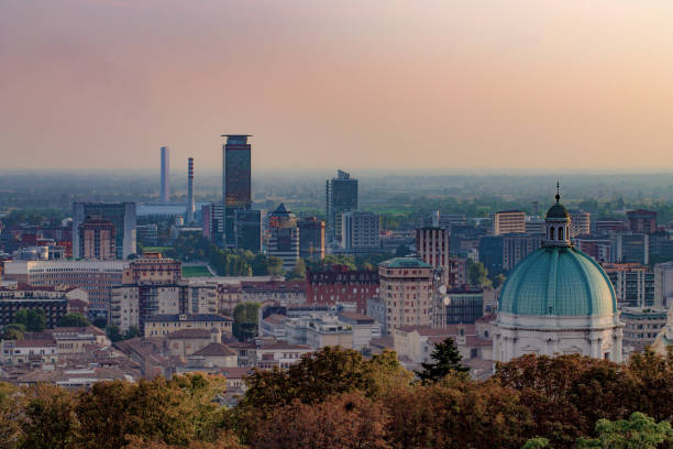 Aerial view of the city of Brescia at sunset Aerial view of the city of Brescia at sunset brescia stock pictures, royalty-free photos & images