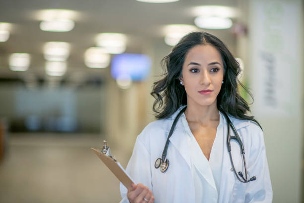 istock Young female doctor at work 1284133940