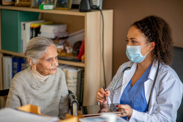 istock Elderly medical patient discusses with doctor 1284134108