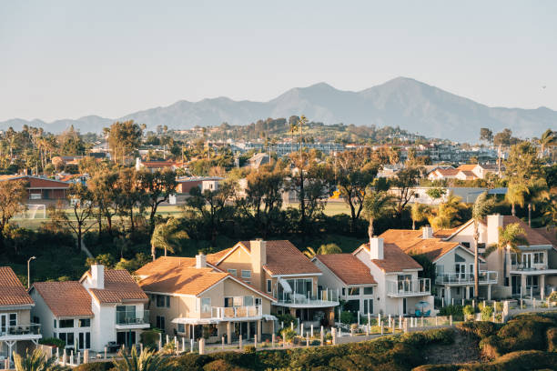 View of houses and hills from Hilltop Park in Dana Point, Orange County, California View of houses and hills from Hilltop Park in Dana Point, Orange County, California dana point stock pictures, royalty-free photos & images