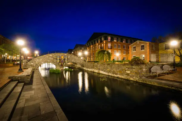 Photo of Bridge over Carroll Creek at night, at Carroll Creek Linear Park, in Frederick, Maryland