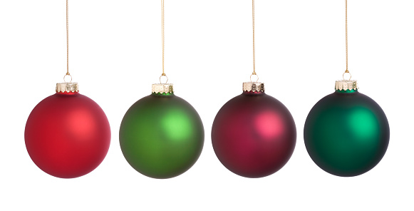 Christmas baubles in red and green isolated on white