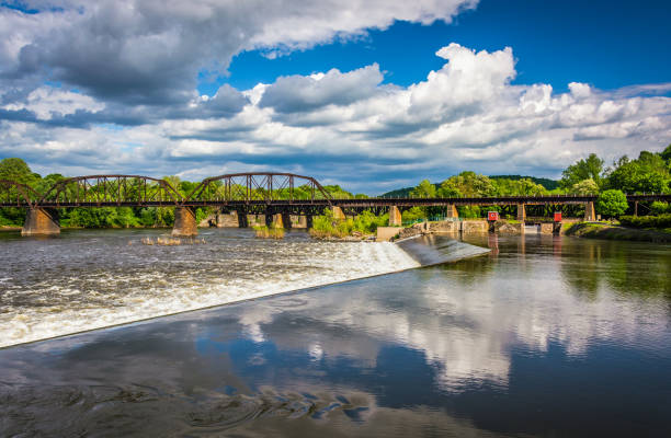 Dam and train bridge over the Delaware River in Easton, Pennsylvania stock photo
