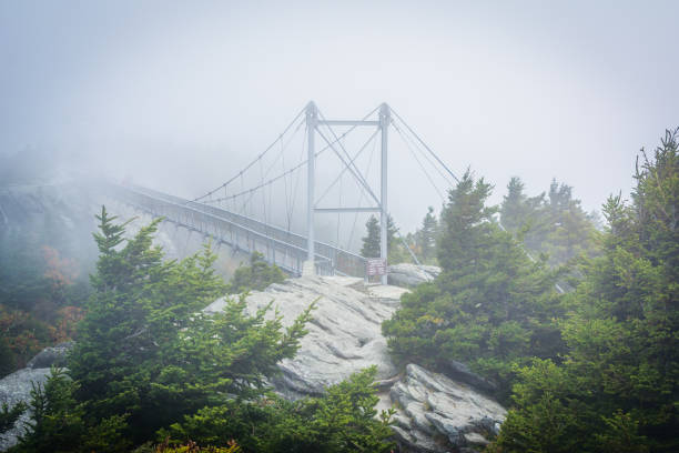 The Mile High Swinging Bridge in fog, at Grandfather Mountain, North Carolina stock photo