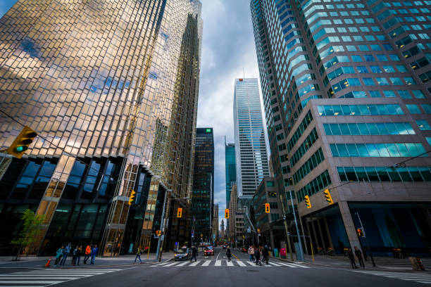 An intersection and modern skyscrapers in downtown Toronto, Ontario stock photo