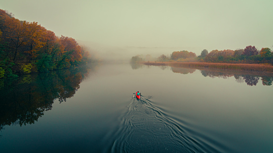 Kayaking on the Huron River on a foggy fall morning