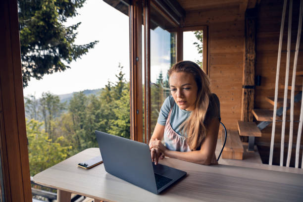 istock Young woman working from home 1284154204