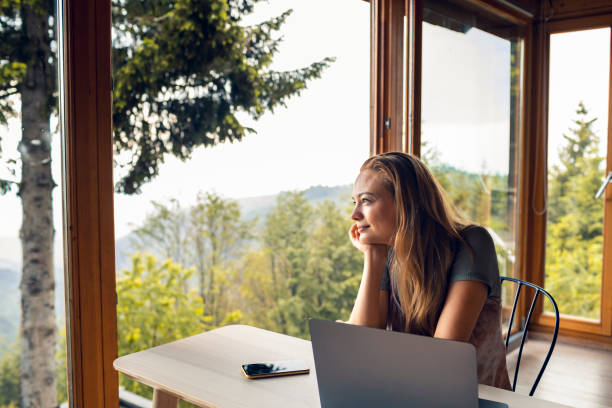 istock Young woman working from home 1284154801