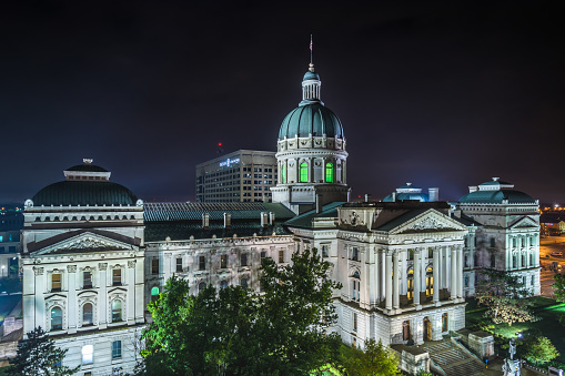 The Indiana Statehouse at night in Indianapolis, Indiana