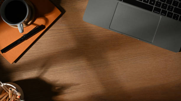 istock Workspace with workspace with laptop, stationery, cup and copy space 1284156134
