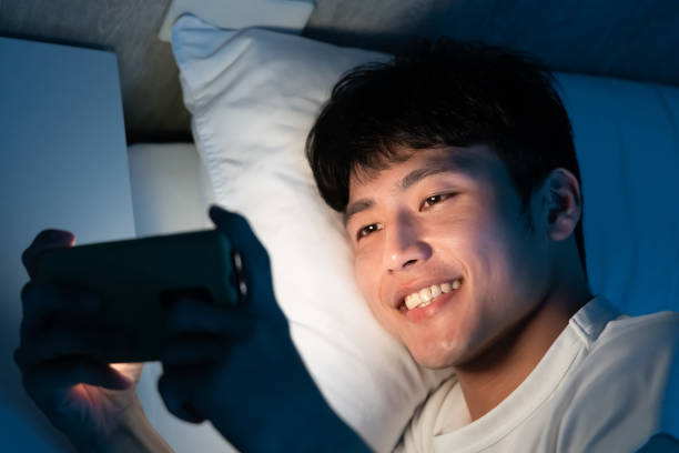 istock man watch video on smartphone 1284160690