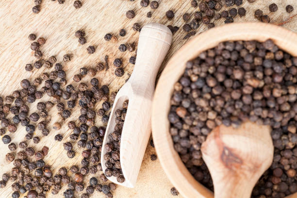 istock black peas pepper on an old wooden table 1284165047