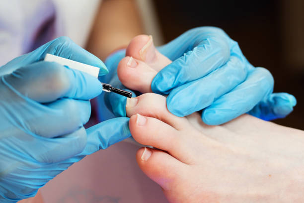 istock Applying gel nail polish 1284165088