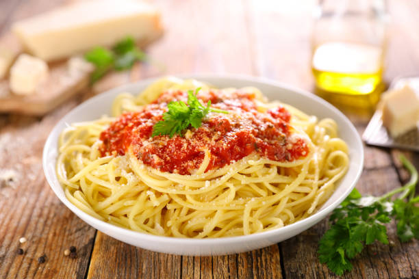 istock spaghetti with tomato sauce and parmesan 1284166712