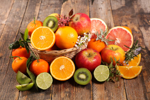 istock fresh fruits on wood background 1284166872