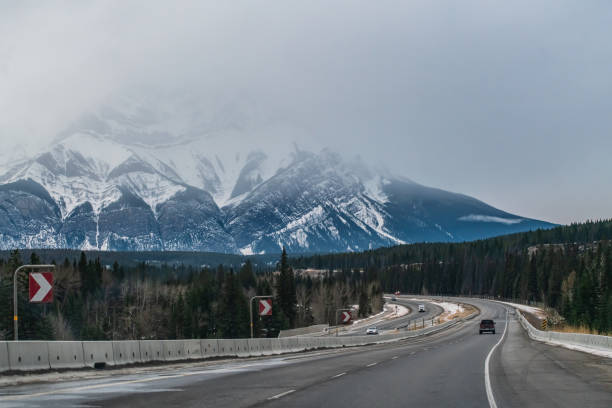 istock Divided Highway Going through the Rocky Mountains 1284167959
