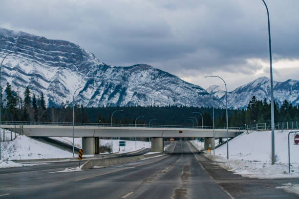 istock Banff, Alberta - Trans Canada Highway with a Bridge going across it 1284169694