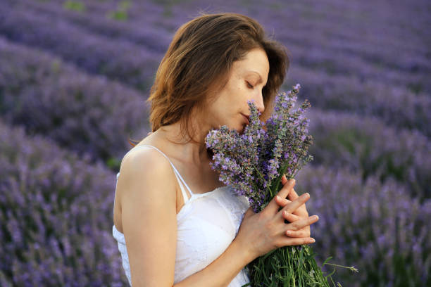 istock Pregnant woman in lavender field 1284169729
