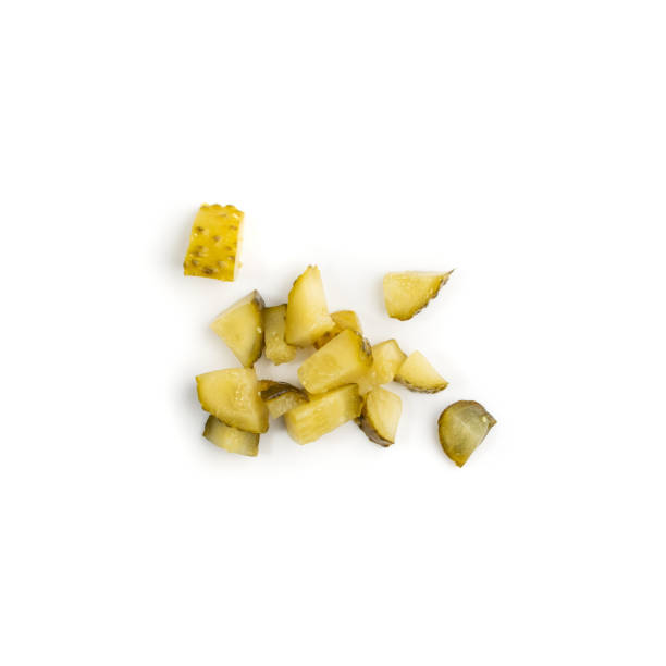 istock Diced Pickled Gherkins or Chopped Cucumbers Isolated on White 1284173758