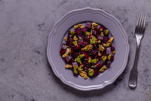 istock Beetroot, pesto sauce and walnut salad 1284174813