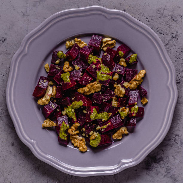 istock Beetroot, pesto sauce and walnut salad 1284174930