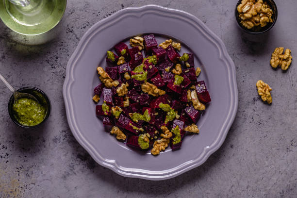 istock Beetroot, pesto sauce and walnut salad 1284174951