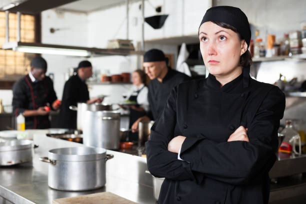 istock Upset female cook in kitchen of restaurant 1284175559
