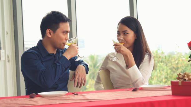 istock Happy romantic couple eating lunch at restaurant 1284183106