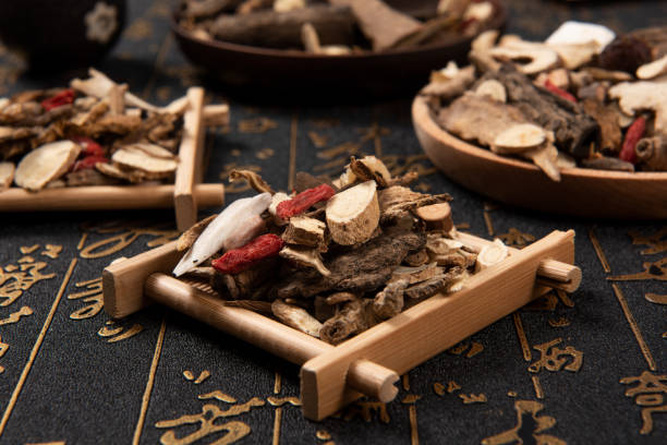 istock Chinese herbal medicine selection on calligraphy background 1284183410