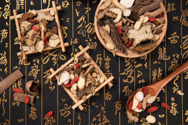 istock Chinese herbal medicine selection on calligraphy background 1284184998