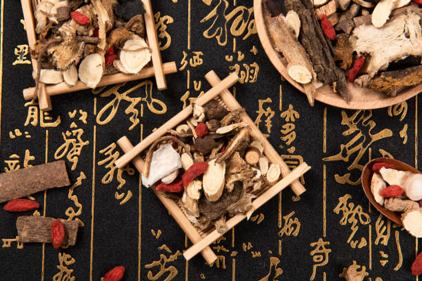 istock Chinese herbal medicine selection on calligraphy background 1284185612