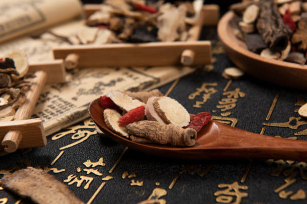 istock Chinese herbal medicine selection on calligraphy background 1284185777