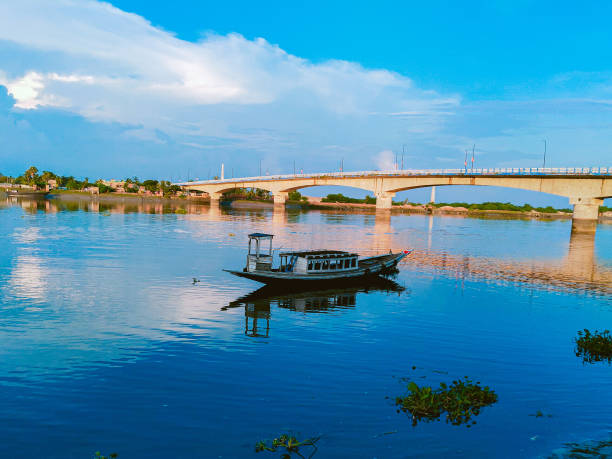 istock A wooden boat on the river . 1284188749