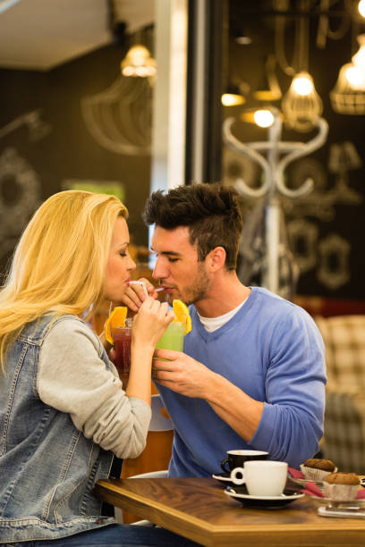 istock Sharing the same drink brings this couple closer together 1284190411