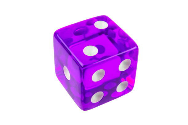 istock Purple glass game dice closeup isolated on white. One, two, four. 1284193143