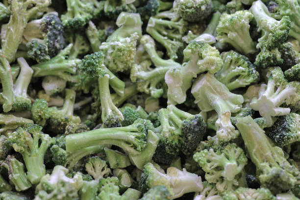 istock Frozen broccoli in a supermarket. Close-up top view. 1284193255