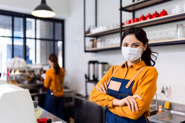 istock asian shopkeeper look to you 1284195727