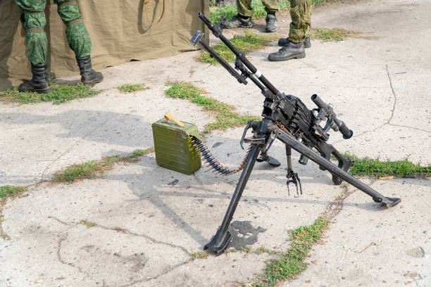 istock A light machine gun on bipod with telescopic sights 1284195944
