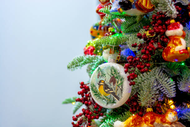 istock Brightly decorated christmas tree with place for text 1284196364