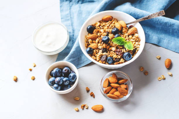 istock Baked granola with yogurt and blueberries. 1284196416