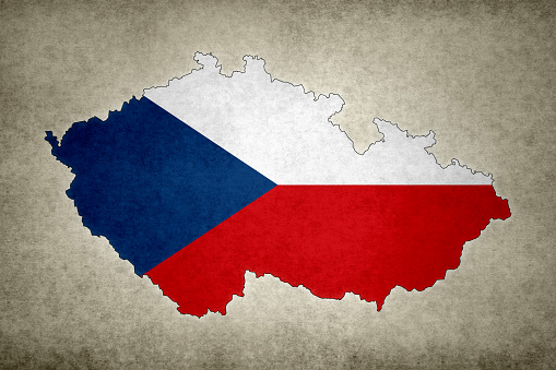 Grunge map of the Czech Republic with its flag printed within its border on an old paper.
