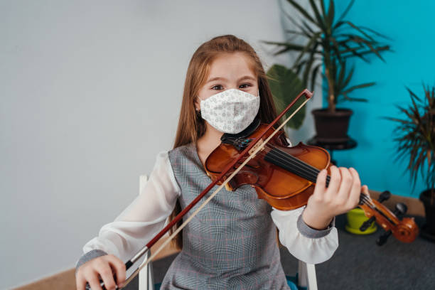 istock Portrait of little violinist 1284198718