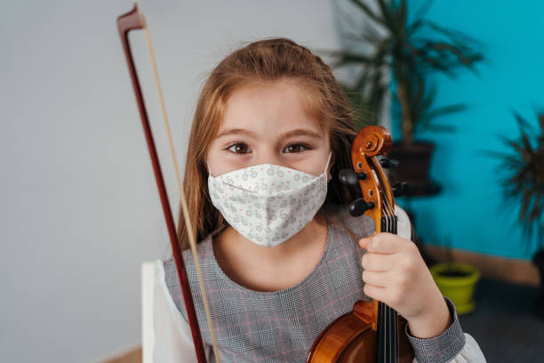 istock Portrait of little violinist 1284198726