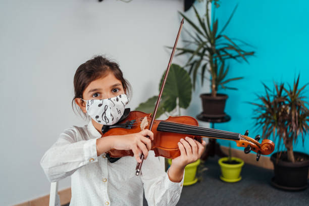 istock Portrait of little violinist 1284198740