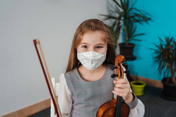 istock Portrait of little violinist 1284198747