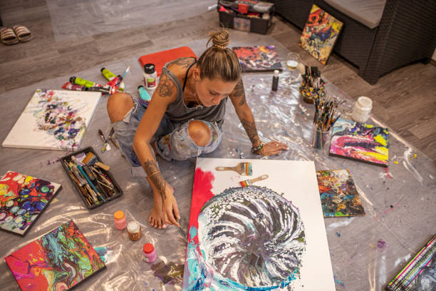 istock Female Artist in studio 1284200001