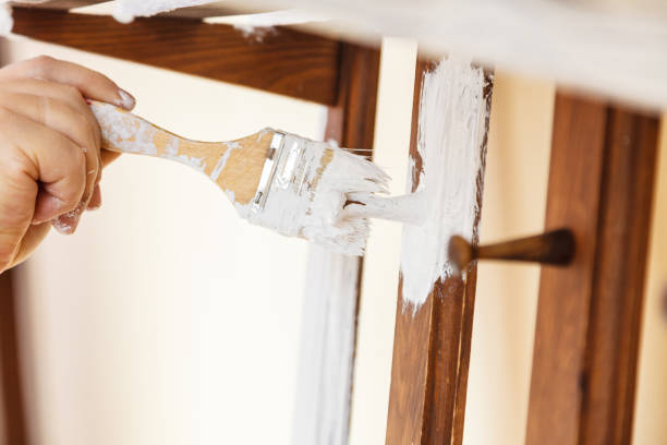 istock Person renovating wooden hanger 1284200031