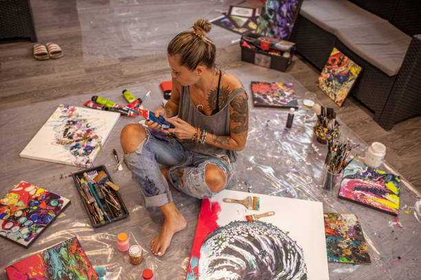 istock Female Artist in studio 1284200234