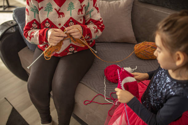istock Little girl learning to knit 1284201376