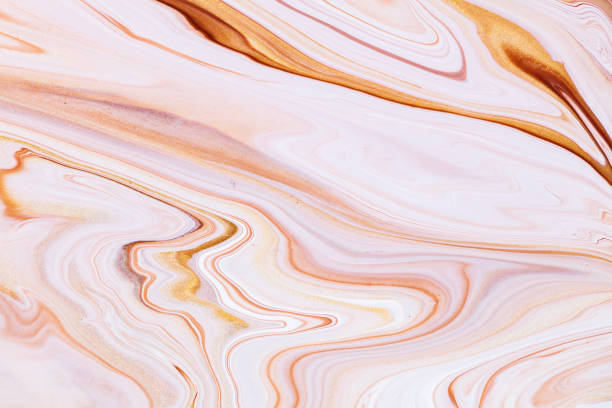 istock Fluid art texture. Background with abstract iridescent paint effect. Liquid acrylic artwork with artistic mixed paints. Can be used for baner or wallpaper. Golden, brown and beige overflowing colors. 1284201414